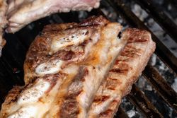 Meat dish served with sauce on plate