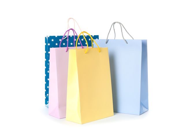 Multicolor paper bags isolated on blank background