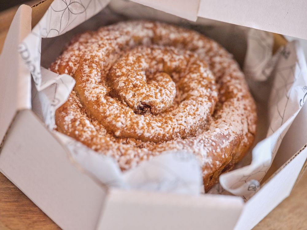Tasty pastry in carton box