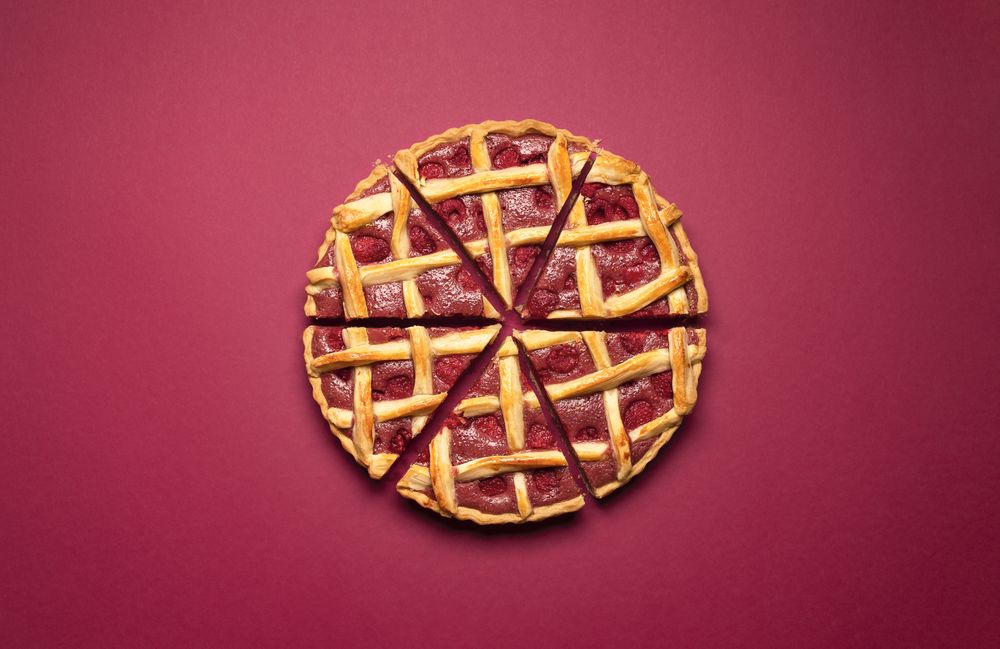Sliced raspberry pie with a lattice crust. Tasty classic dessert