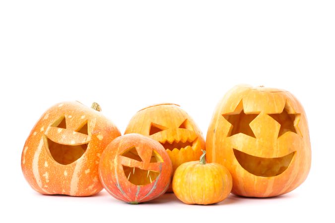 Halloween decorative pumpkins isolated on plain background