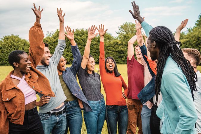 Joyful friends celebrating in the park