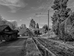 Bending Train tracks next to flea market chalet
