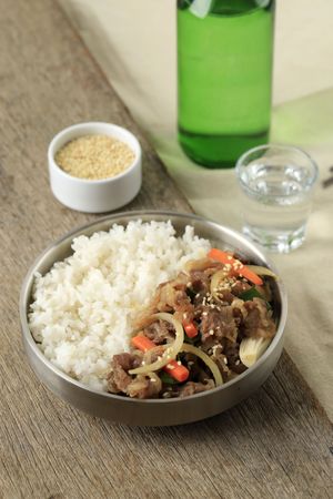 Rice Beef Bulgogi on Silver Plate Bowl, Korean Style Food with Soju