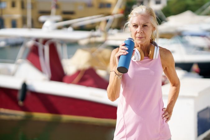 Older female drinking between  exercise
