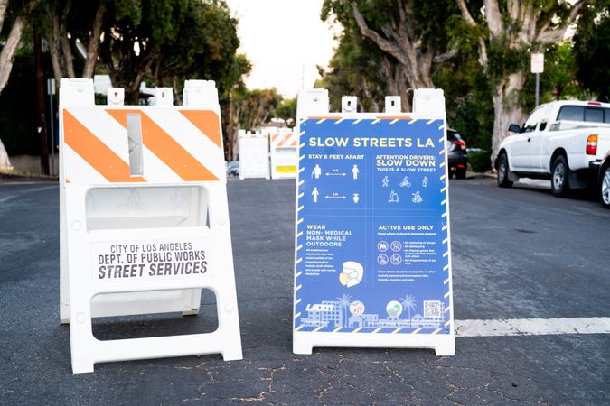 “Slow Streets LA” sign on urban street in Los Angeles
