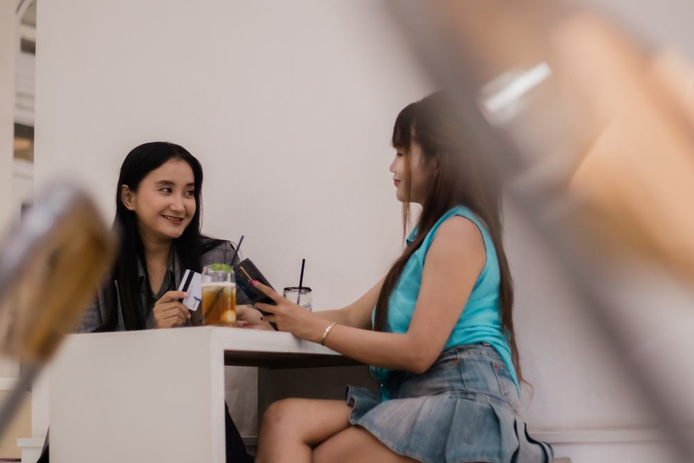 Casual hangout, Two young friends at cafe