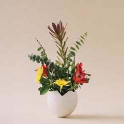 Easter egg shell with flowers and leaves