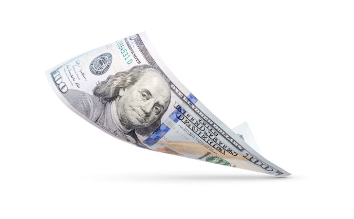 One Hundred Dollar Bill Floating Down To Surface with Drop Shadow