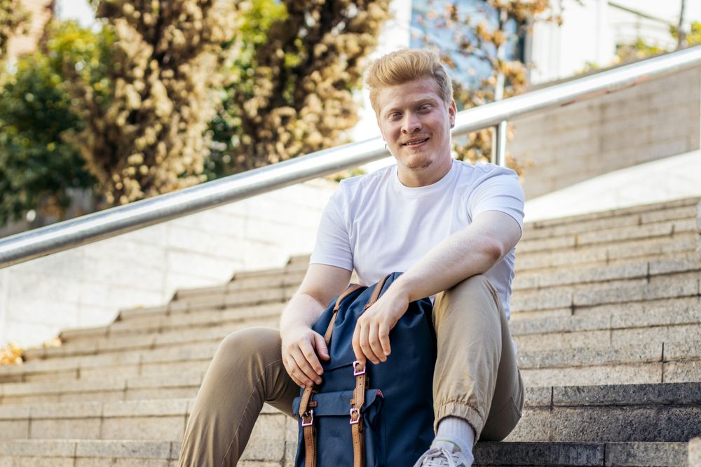 Portrait of a Latino man with albinism in the city