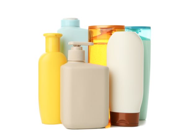 Blank bottles for cosmetics isolated on light background