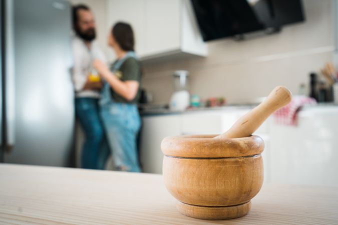 Mortar and pestle on table in kitchen