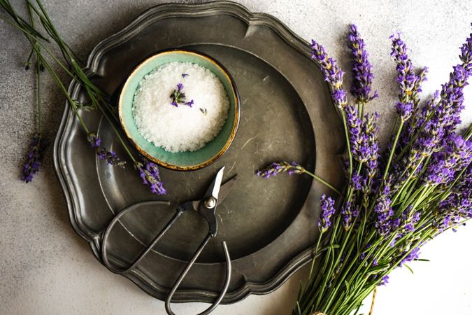Top view of summer table setting with lavender flowers with salt