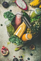 Fresh made fruit and vegetable juices in glass bottles