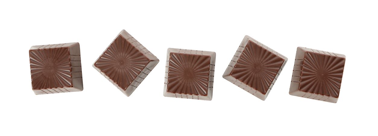 Tasty chocolate candies isolated on studio background