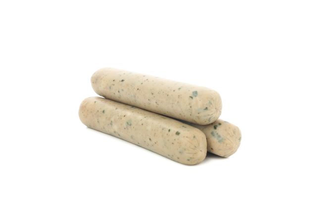Light colored sausages stacked on blank background