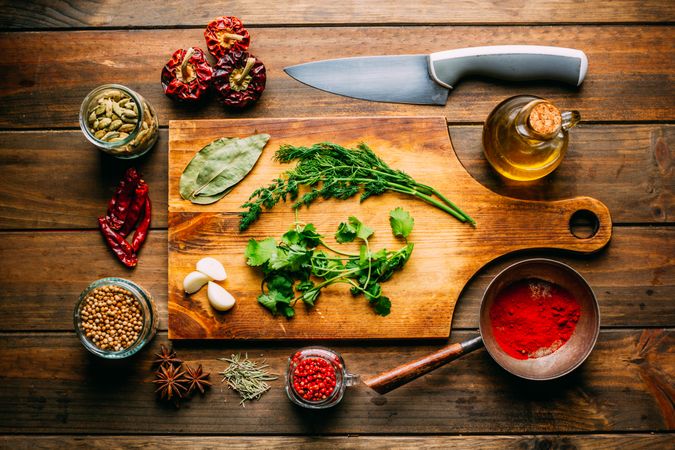 Spices and oil near knife