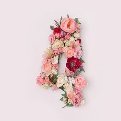 Number 4 made of real natural flowers and leaves