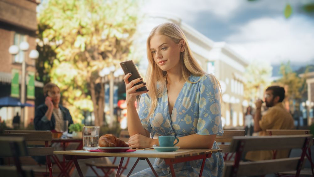 Woman Using Smartphone, Chatting with Friends Online, Checking Social Media and Work Emails