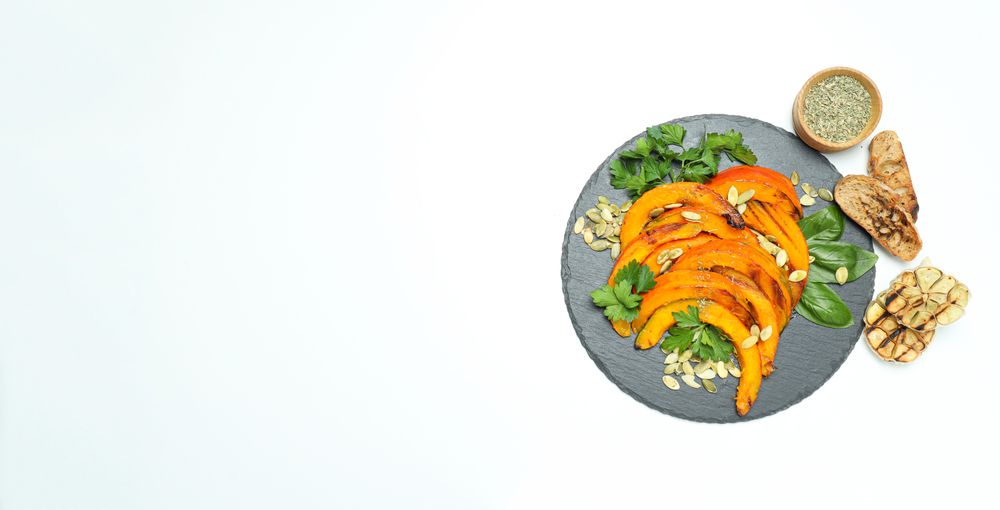 Concept of tasty homemade dish - baked pumpkin