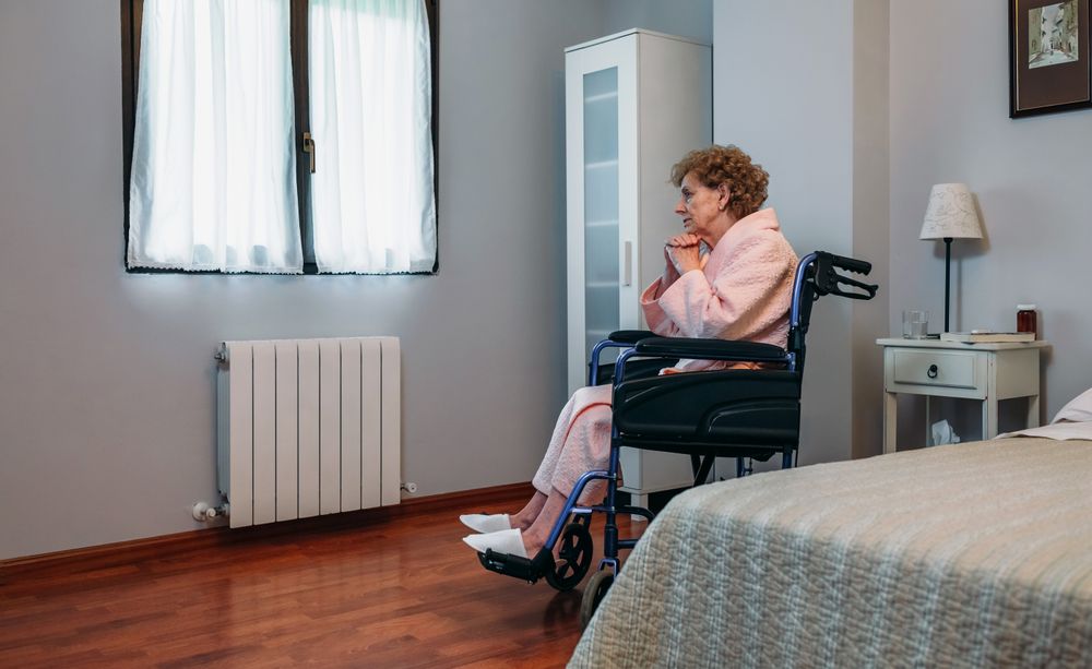 Woman in a wheelchair alone