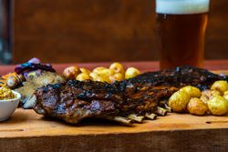Smoked pork ribs with sauces