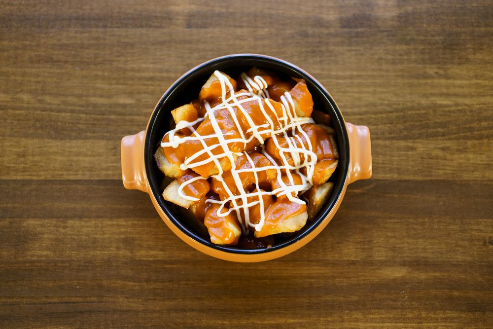 Top view of plate of patatas bravas
