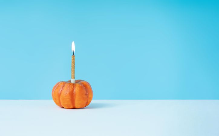 Squash with single birthday candle
