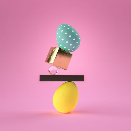 3D render of dyed Easter eggs with minimalistic objects and pink background