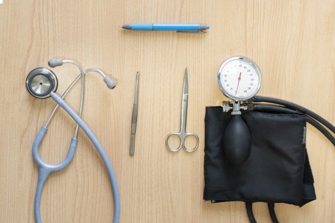 Stethoscope near surgeon equipments and pulsometer