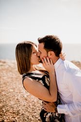 Tender lovers cuddling on seashore