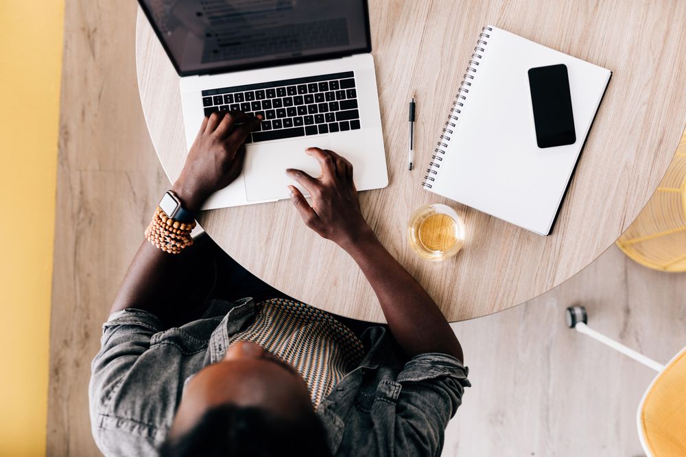 Aerial view of man working on a laptop