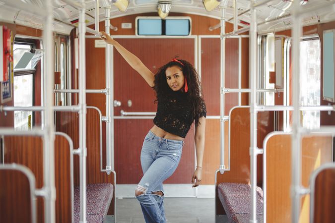 Cheerful woman in train car