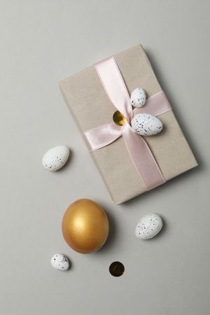 Concept of Richness, golden eggs, top view