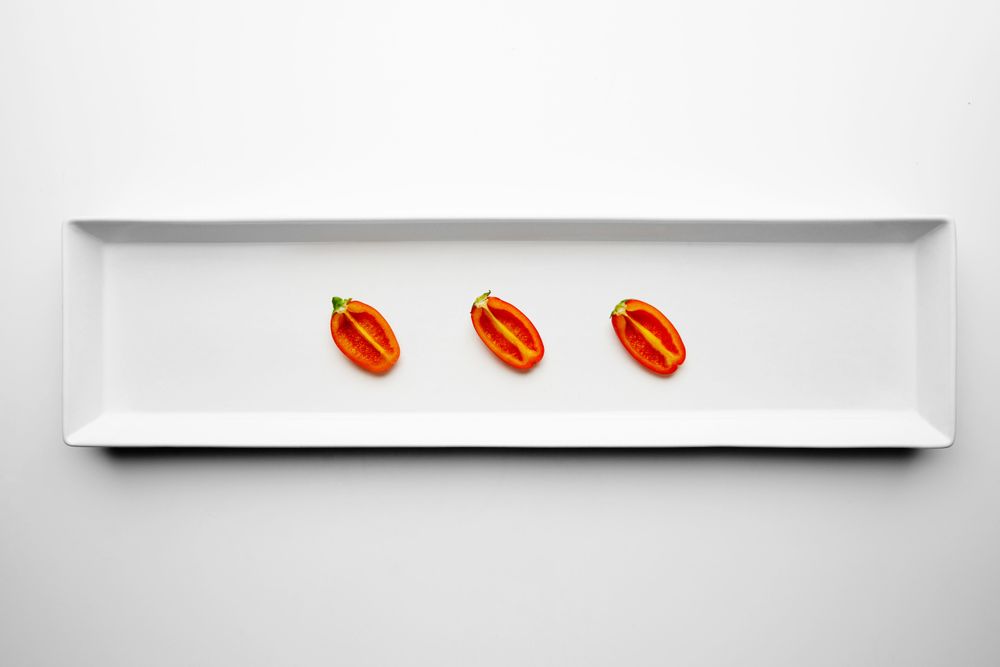 Cherry tomatoes arranged on appetizer plate