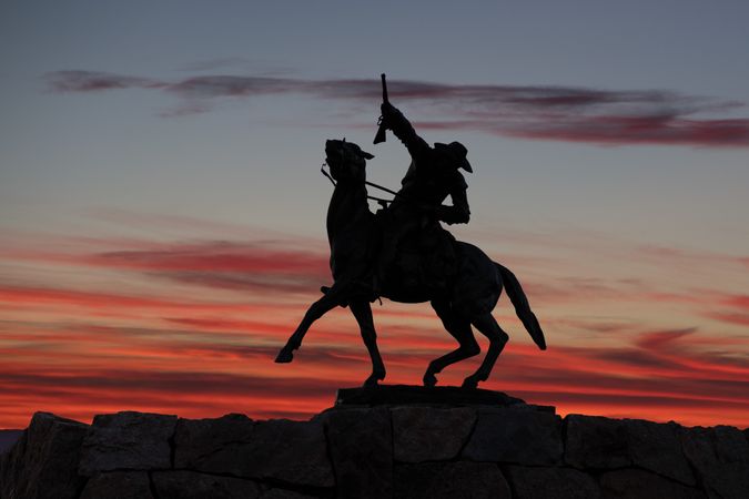 Silhouette of "Buffalo Bill” at sunset in Cody, Wyoming