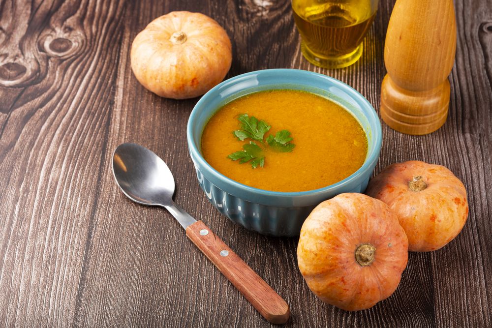 Delicious homemade pumpkin soup in bowl.