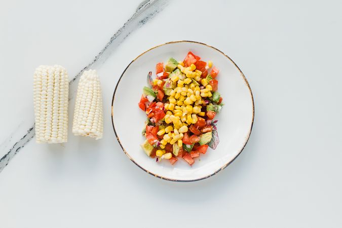 Served corn tomatoes and zucchini