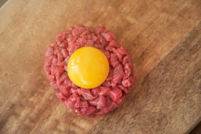 Beef steak tartare with egg yolk