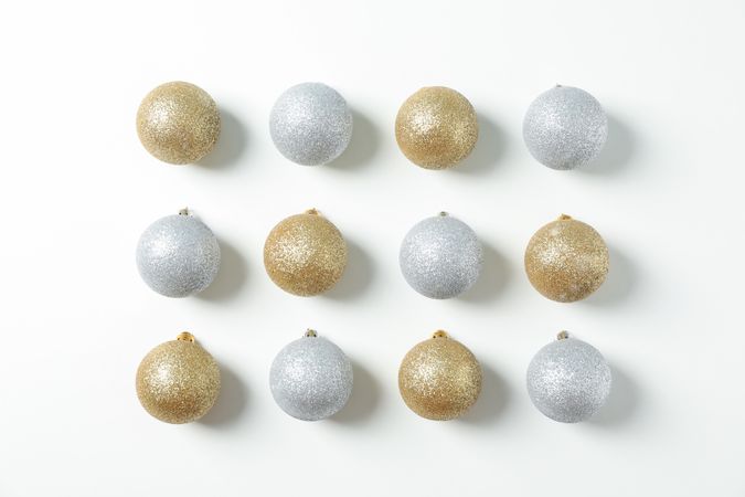 Flat lay with christmas balls on blank background, space for text