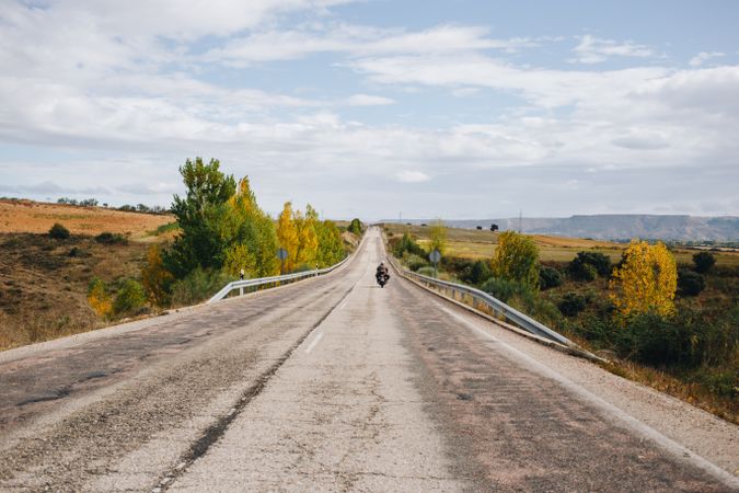 Motorcyclist on scenic road