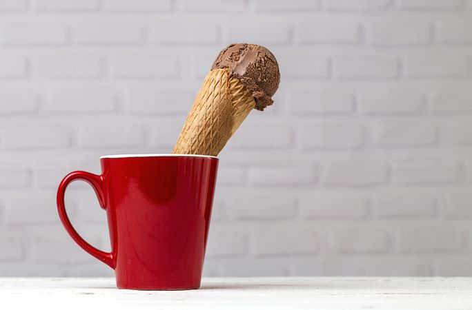 Chocolate ice cream cone in red cup