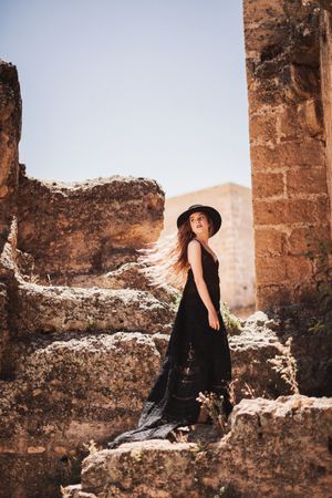 female in ruins of old castle