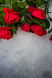 Red roses on marble counter