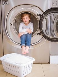 Calm boy in washing machine