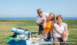 Adult family enjoying a scenic picnic 48xwZ4