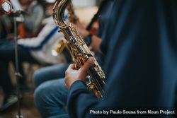 Close up of student playing the saxophone during band class 43P9gb