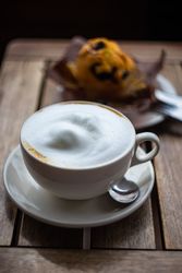 Cup of frothy morning cappuccino