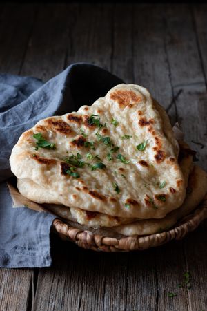 Plate with naan flatbread and napkin