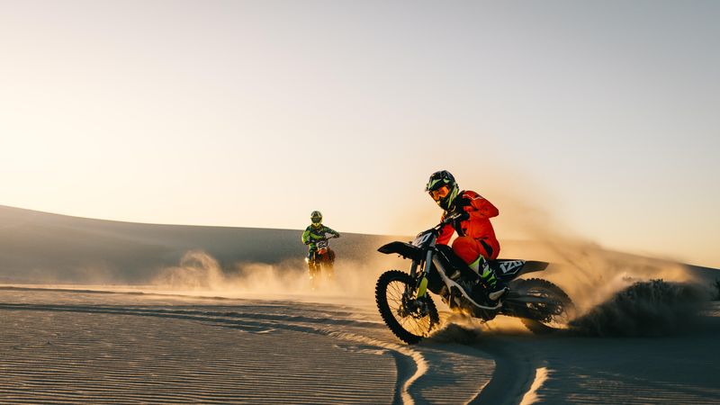 Dirt bikers off roading in desert